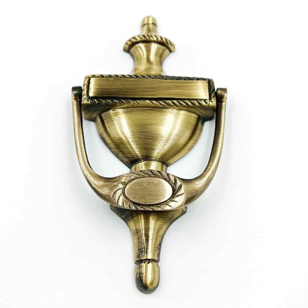 Brass antique door knocker woldcup