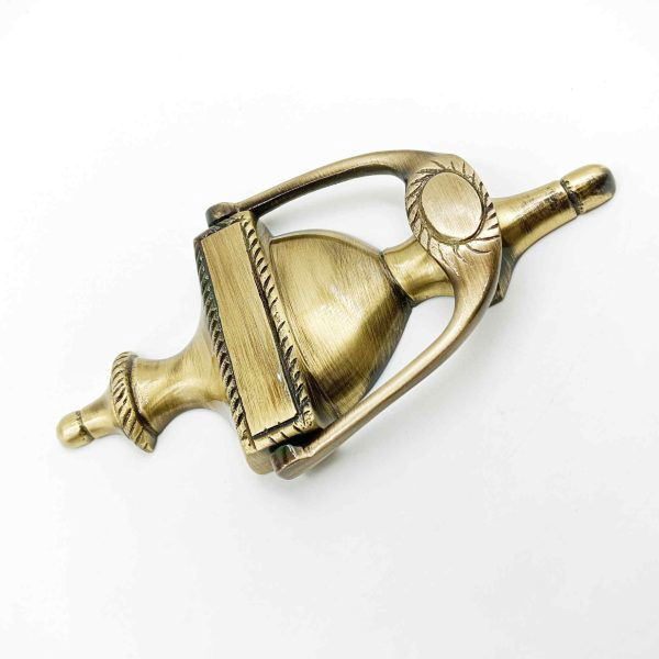 Brass antique door knocker woldcup