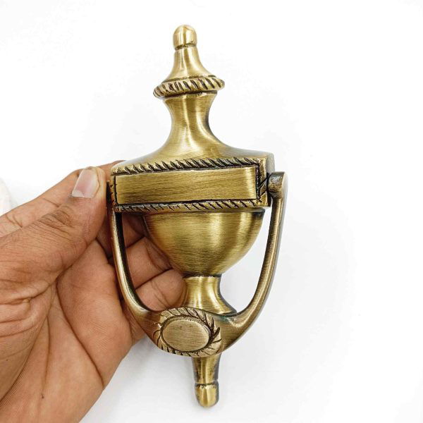 Brass antique door knocker woldcup